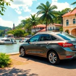 Kuching rent car near a scenic waterfront, showcasing lush landscapes and colonial architecture.